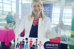Laura with 'Happy 75th Birthday NHS' Sign